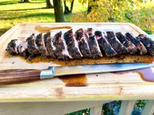 Sliced Pork Tenderloin on cutting board