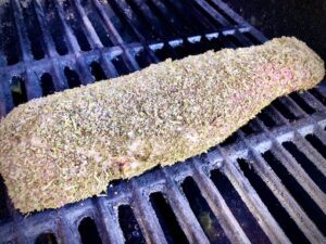 Herb Crusted Pork Tenderloin on grill