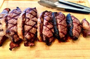 Sliced Sirloin Coulotte on cutting board