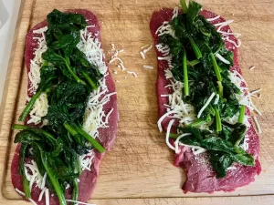 stuffed top round on a cutting board