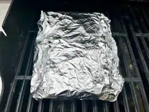 Ribs in foil on the grill